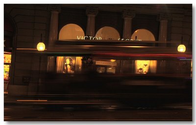 Cable car passing by Victoria's Secret Store