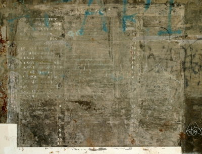 Preservation. Original crew board for gun #1 painted directly on casemate wall. Almost faded to obscurity.