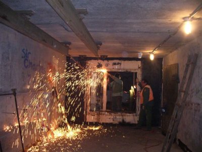 anuary 29, 2008. Cutting out steel doors at north end of main corridor.