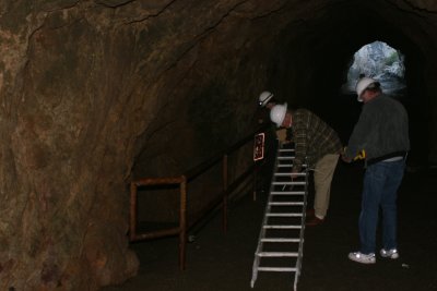 Preparing ladder to go down into sea cave