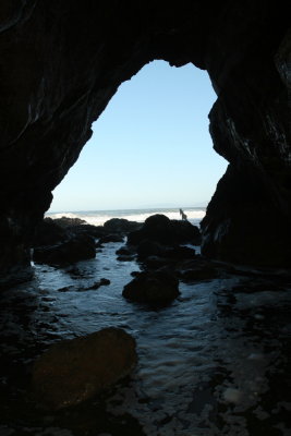 Sea cave opening. Part of OHIOAN shipwreck at right.