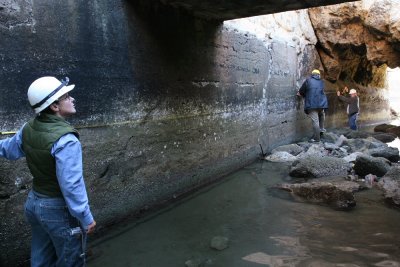 Measuring the concrete side walls of channel