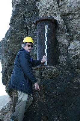 John Hall measuring the vertical mystery pipe