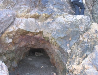 Newly discovered cave below north portal. Tracks just out of view at bottom. (John Hall)