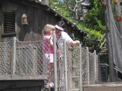 Patti explaining a waterwheel to Astrid