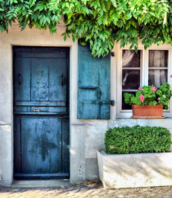 Once upon a time a little blue door drew a curious visitor in...