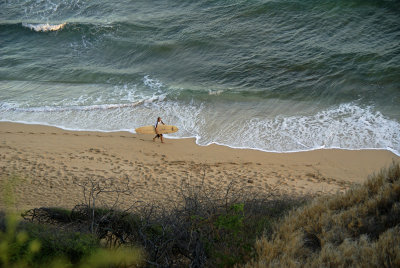 Kaalawai beach surfer