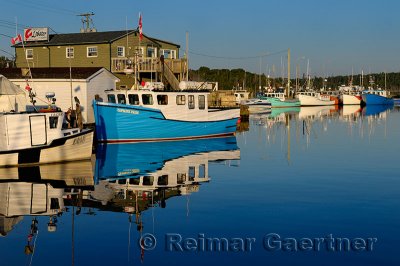 Fishing boats at sunrise at Fishermans Cove Eastern Passage Halifax Nova Scotia