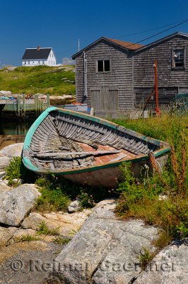 Abandoned boat on the rocks in full sun at Peggys Cove Nova Scotia