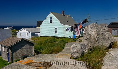 Rural fishing village houses and laundry at Peggys Cove Nova Scotia