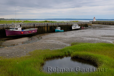 Belliveau Cove Lighthouse at low tide on the Bay of Fundy Nova Scotia