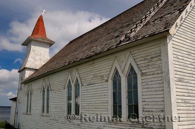 Christ Anglican Church with bent steeple and cross at Clarkes Head Gander Bay Newfoundland
