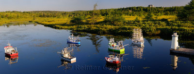 Panorama of model ships and lighthouse on river between Mobile and Witless Bay Newfoundland