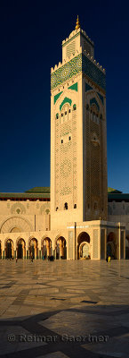 Vertical panorama of the worlds tallest minaret at Hassan II Mosque Casablanca Morocco at sunset