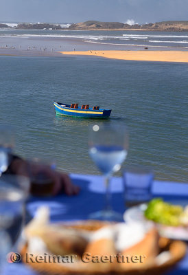 Lunch table overlooking the Atlantic Ocean coast at Oualidia Morocco