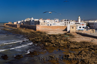Atlantic coast and North bastion and ramparts of Essaouira Morocco viewed from Sqala du Port