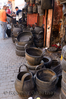Shop selling containers made of reused rubber tires in the souk of Marrakech Morocco
