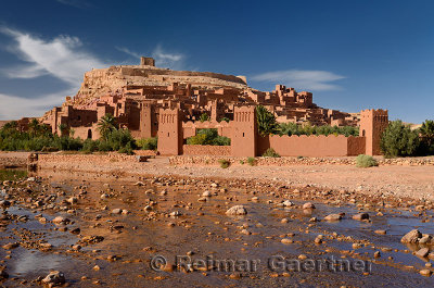 Ait Benhaddou with shallow water of Ounila River or Wadi Mellah near Ouarzazate Morocco
