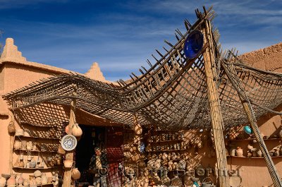 Pottery shop with wavy roof next to the Ait Ben Moro Kasbah in Skoura Morocco