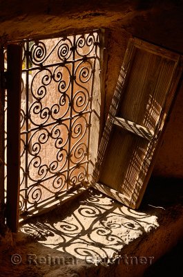 Ancient window and shutter in the historic Kasbah Amerhidil in the Skoura oasis Morocco