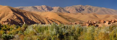 Panorama with Ait Arbi Kasbah ruins along the Dades Gorge river of the High Atlas mountains Morocco