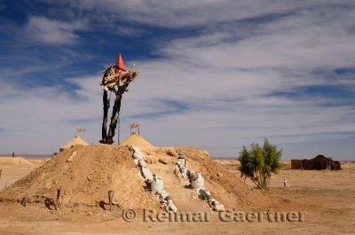 Berber tent and earth mound at a Khettara well in the arid Tafilalt basin of Morocco