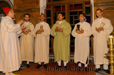 Traditional sufi brotherhood music group with chanting with darboukas in Fes Morocco