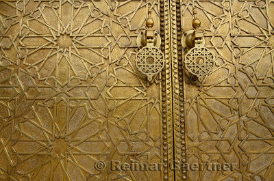 Detail of the intricate engraving on the brass doors to the Dar El Makhzen palace in Fes Morocco
