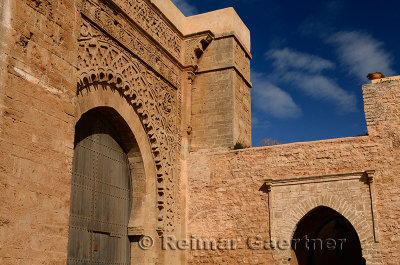 Red ochre stone arch of Bab Oudaia entrance gate to Kasbah in Rabat Morocco