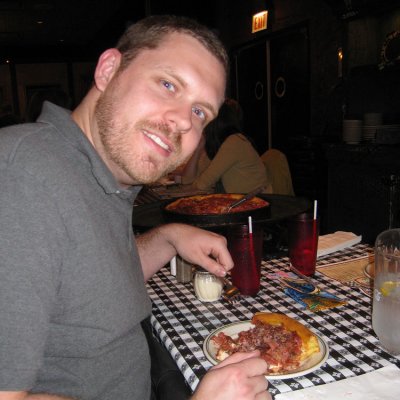 Chris and a slice of the appropriately named Meat Legend