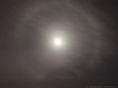 Moon in a light cloud circle