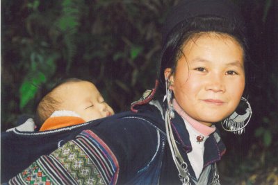 Black Hmong mother and baby, around Sapa
