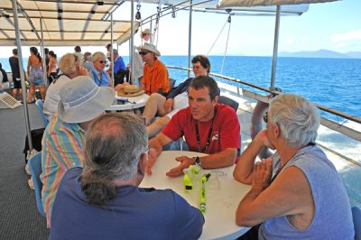 Travelers and Professional Diver in Red Shirt