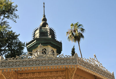 Elaborate gazebo, and  high top of building in back