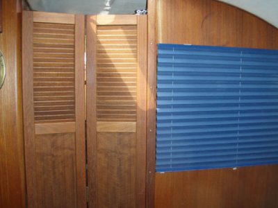 bi-fold salon door closed, privacy  curtain down