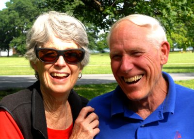Kitty and Roger share a laugh.