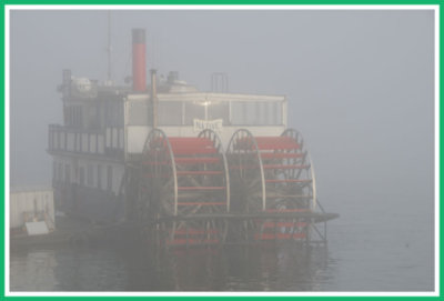 Paddlewheeler in the mist.