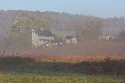 Caretaker's house, as fog lifts