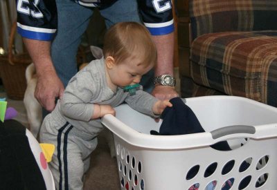 Taking a break and helping with the laundry