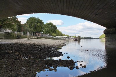 Underneath the arches.