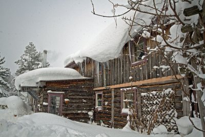  snow on the side of the house