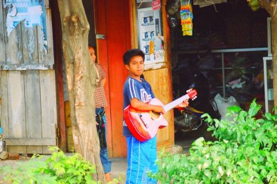 A boy with a guitar