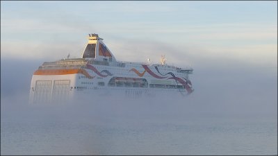 Cruise ship in fog