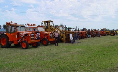 A close look at the second line of Chamberlain products. The two tractors closest to the camera are road-going, fully road-registered tractors belonging to members of the Chamberlain 9G Tractor Club. These people tour all over Australia, using the tractors as their primary transport, and camping out at night. Some of them tow small trailers with camping gear and supplies in them, others have back-up regular vehicles along.