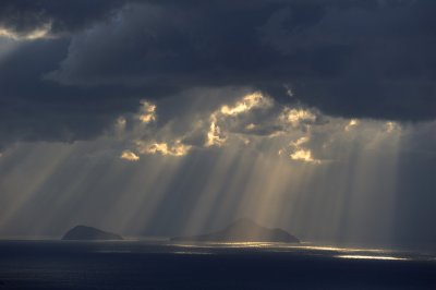 Santorini. Hristiana island under the sun beams