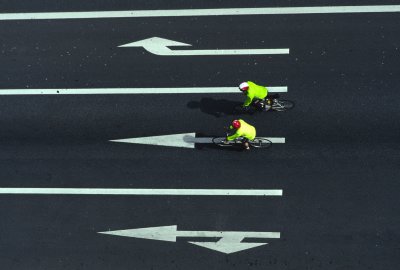 BICYCLISTS AND ARROWS