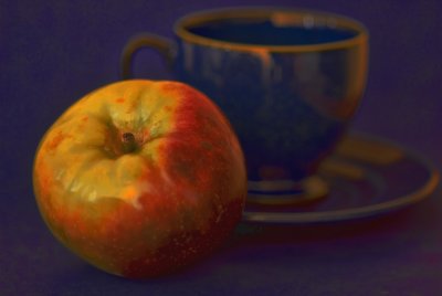 Apple and tea cup
