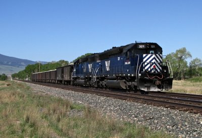 MRL 321 & 264 on ballast train service east of Livingston, MT. 5/29/09