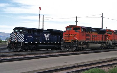 The 840's power passing the loaded coal at Helena, MT. 5/29/09