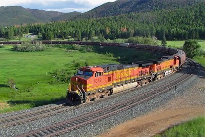 Westbound loaded Grain 'worm' rounding the curve at Austin, MT. (7/9/10)